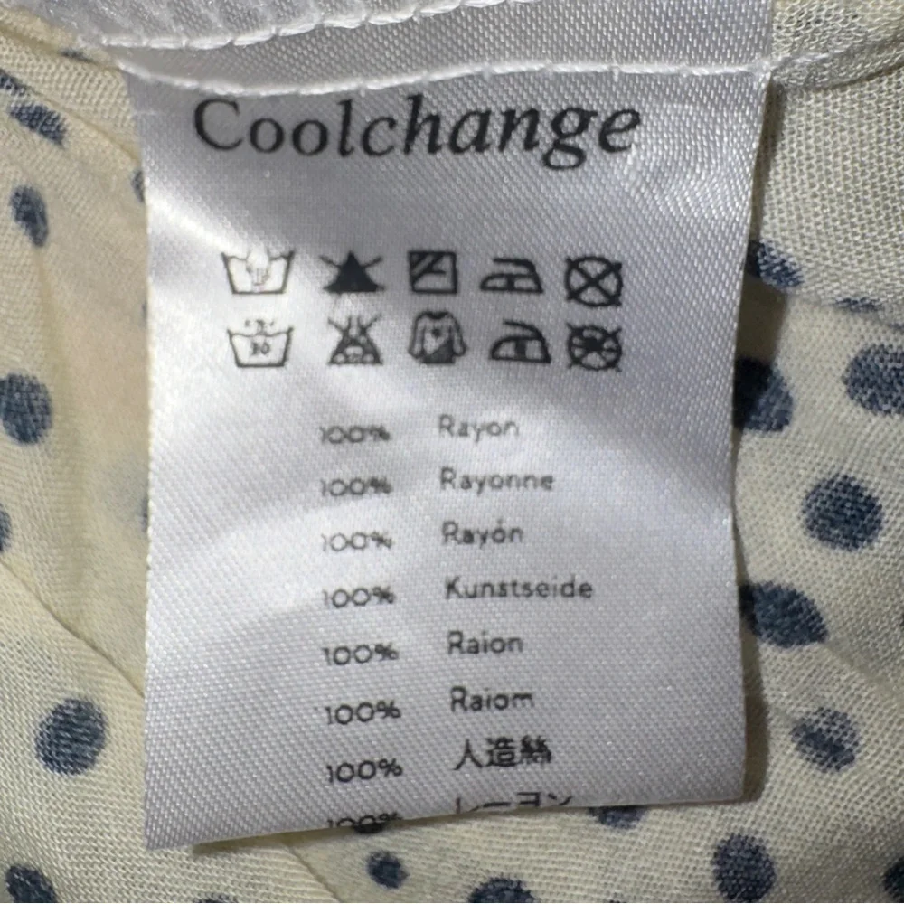 Coolchange Ivory mini dress with black‎ polka dots size small